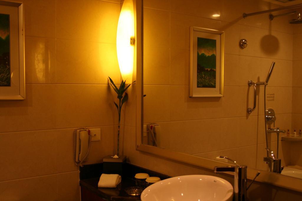 Merryland Traders Hotel Changshu Habitación foto
