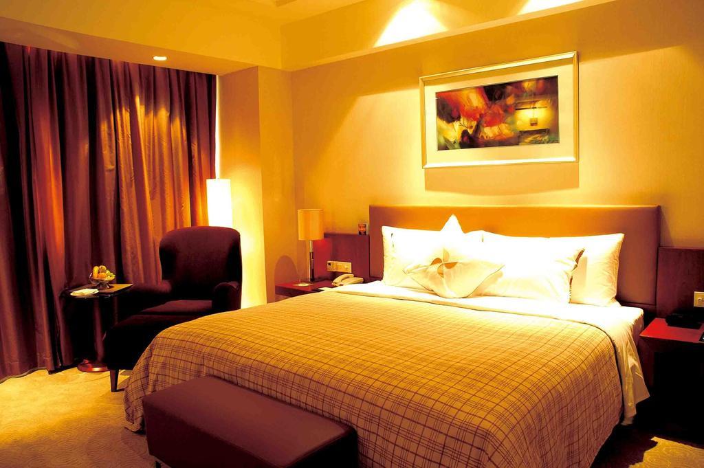 Merryland Traders Hotel Changshu Habitación foto