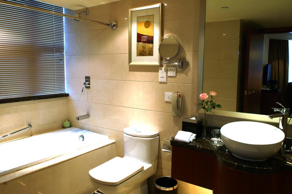 Merryland Traders Hotel Changshu Habitación foto